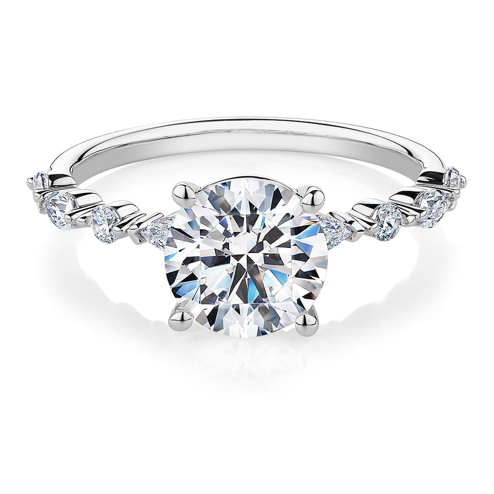 Round Brilliant and Pear shouldered engagement ring with 2.68 carats* of diamond simulants in 14 carat white gold
