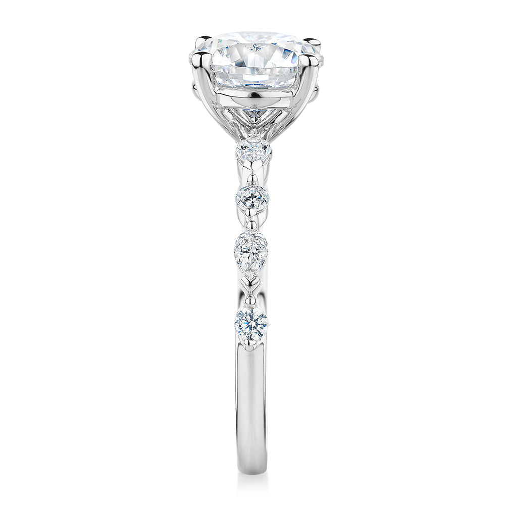 Round Brilliant and Pear shouldered engagement ring with 2.68 carats* of diamond simulants in 14 carat white gold