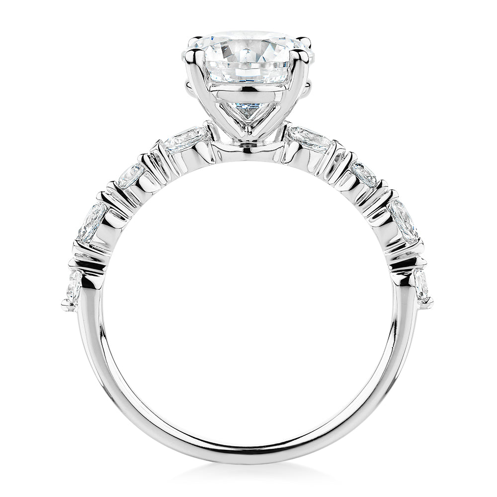 Round Brilliant and Pear shouldered engagement ring with 2.68 carats* of diamond simulants in 14 carat white gold