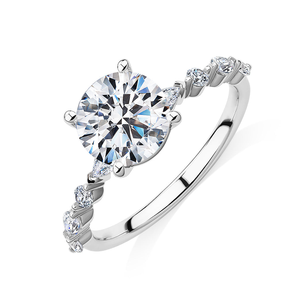 Round Brilliant and Pear shouldered engagement ring with 2.68 carats* of diamond simulants in 14 carat white gold