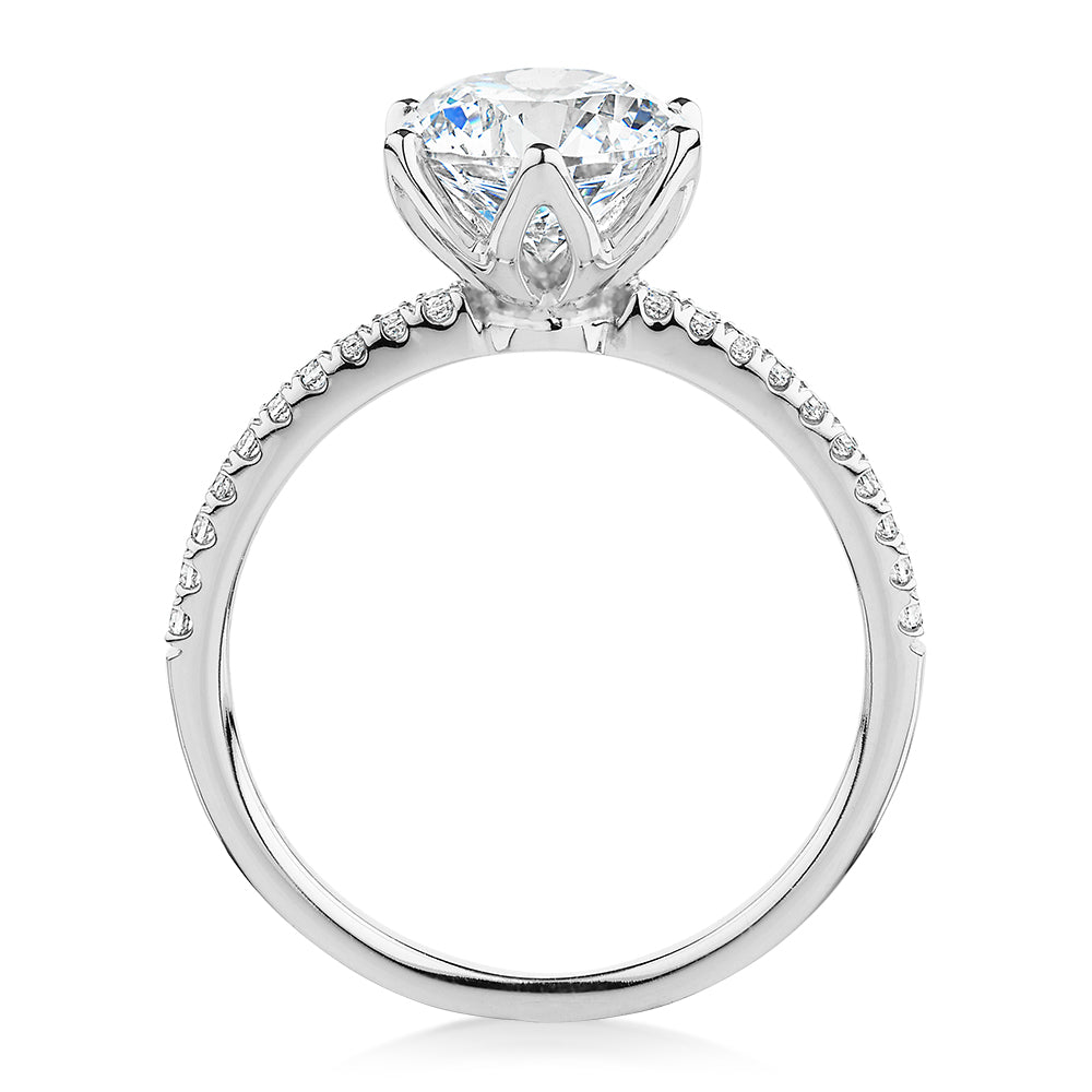 Round Brilliant shouldered engagement ring with 2.24 carats* of diamond simulants in 14 carat white gold