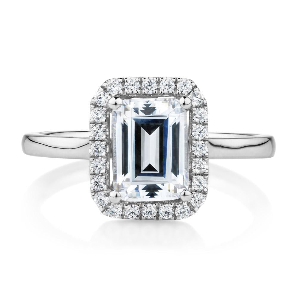 Emerald Cut and Round Brilliant halo engagement ring with 1.92 carats* of diamond simulants in 14 carat white gold