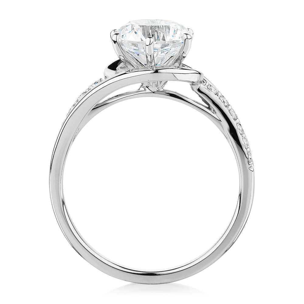 Round Brilliant shouldered engagement ring with 2.18 carats* of diamond simulants in 14 carat white gold