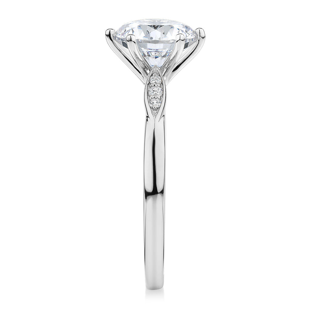 Round Brilliant shouldered engagement ring with 2.08 carats* of diamond simulants in 14 carat white gold