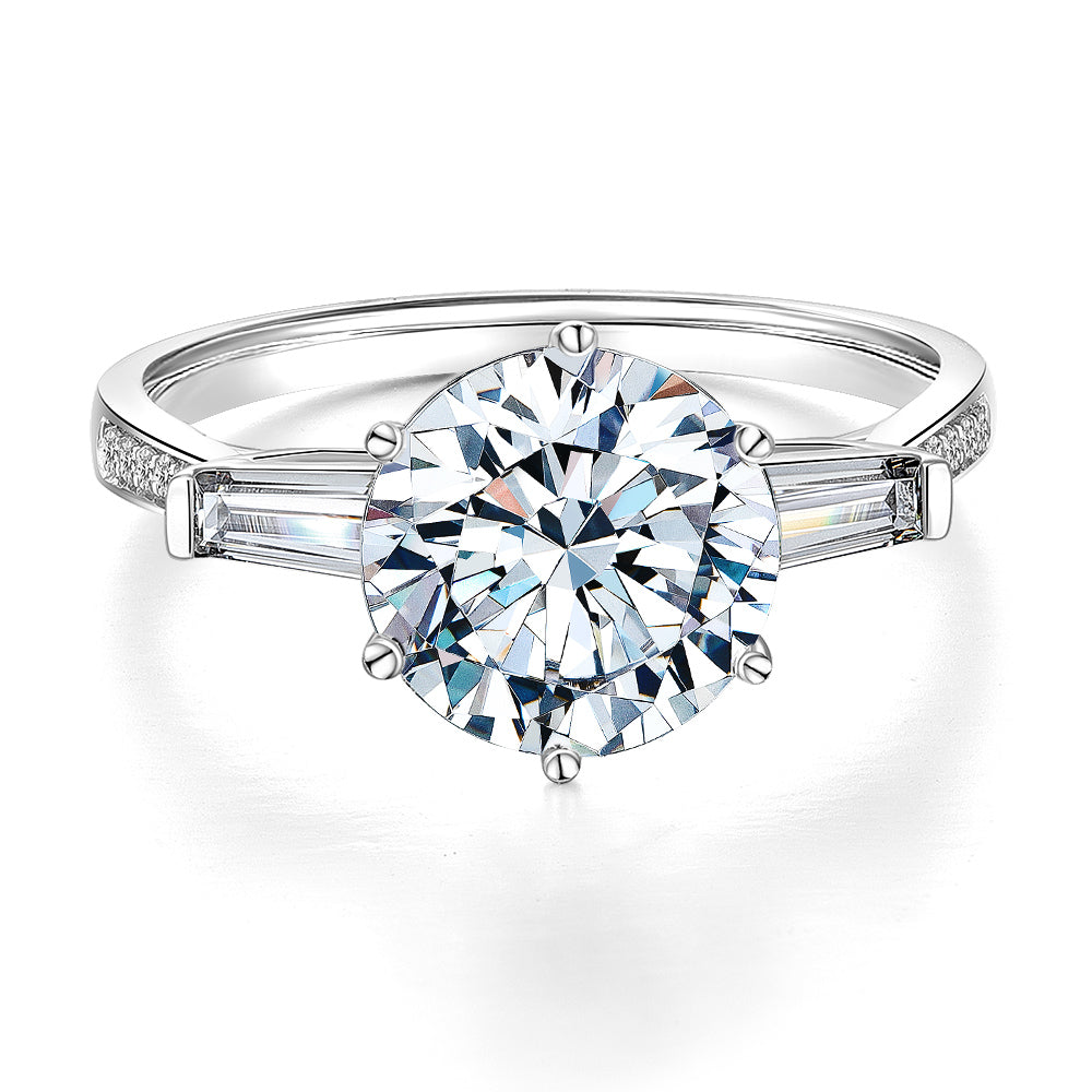 Round Brilliant and Baguette shouldered engagement ring with 3.23 carats* of diamond simulants in 14 carat white gold
