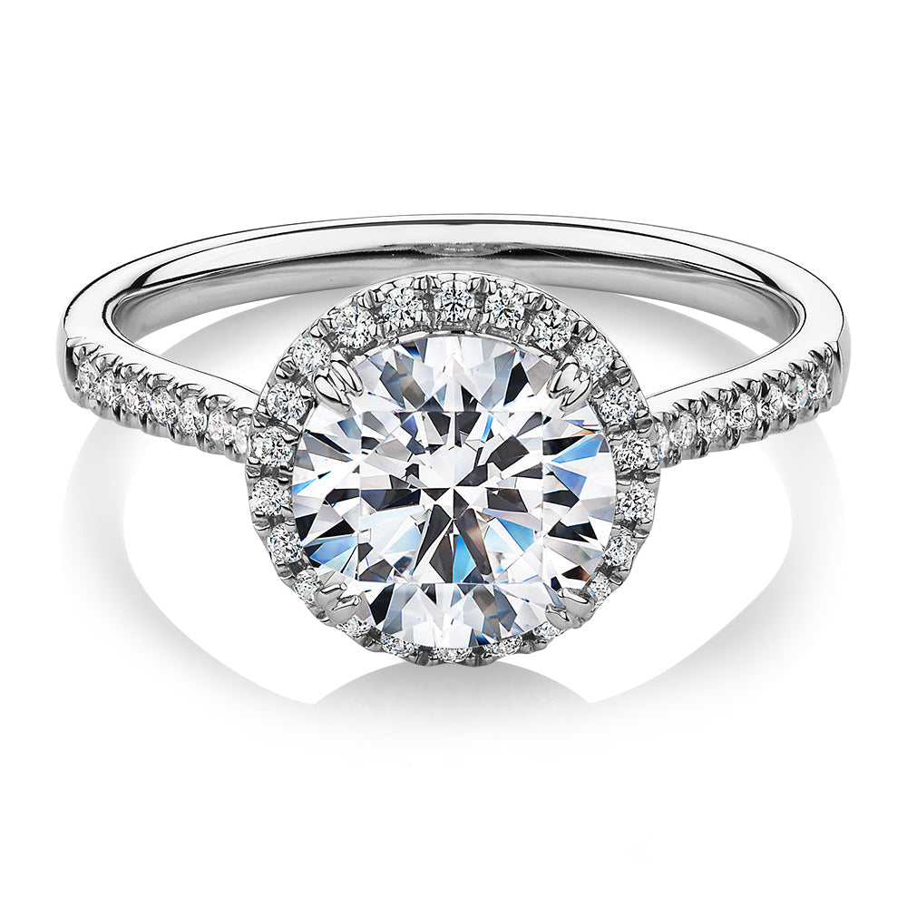 Round Brilliant halo engagement ring with 2.27 carats* of diamond simulants in 14 carat white gold