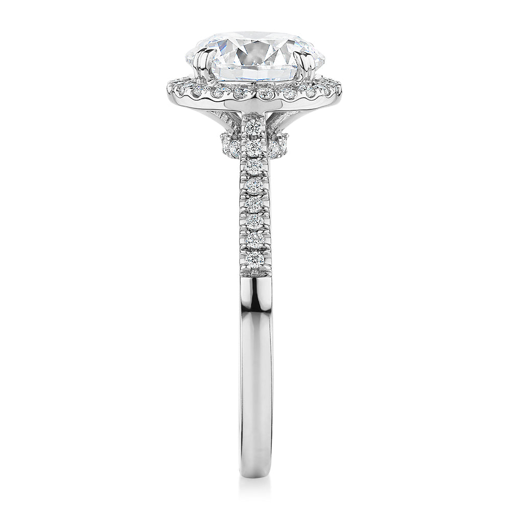 Round Brilliant halo engagement ring with 2.27 carats* of diamond simulants in 14 carat white gold