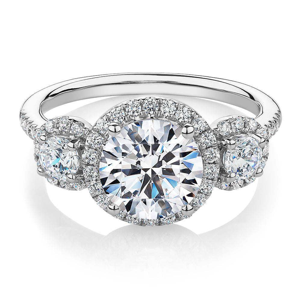 Three stone ring with 2.68 carats* of diamond simulants in 10 carat white gold