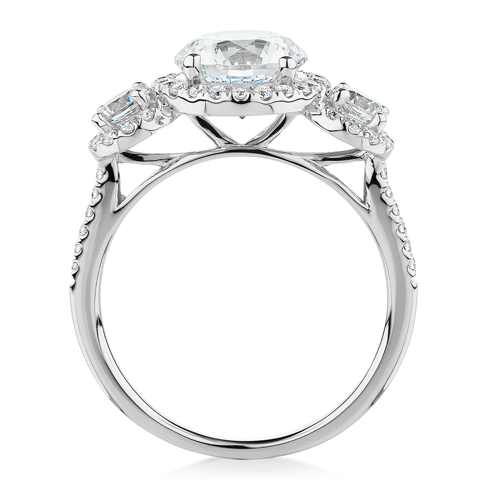 Three stone ring with 2.68 carats* of diamond simulants in 10 carat white gold