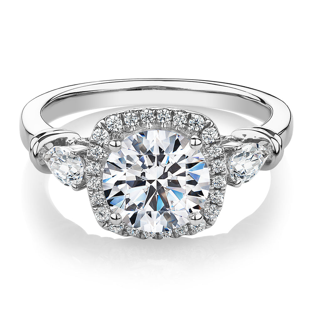 Round Brilliant halo engagement ring with 2.78 carats* of diamond simulants in 14 carat white gold