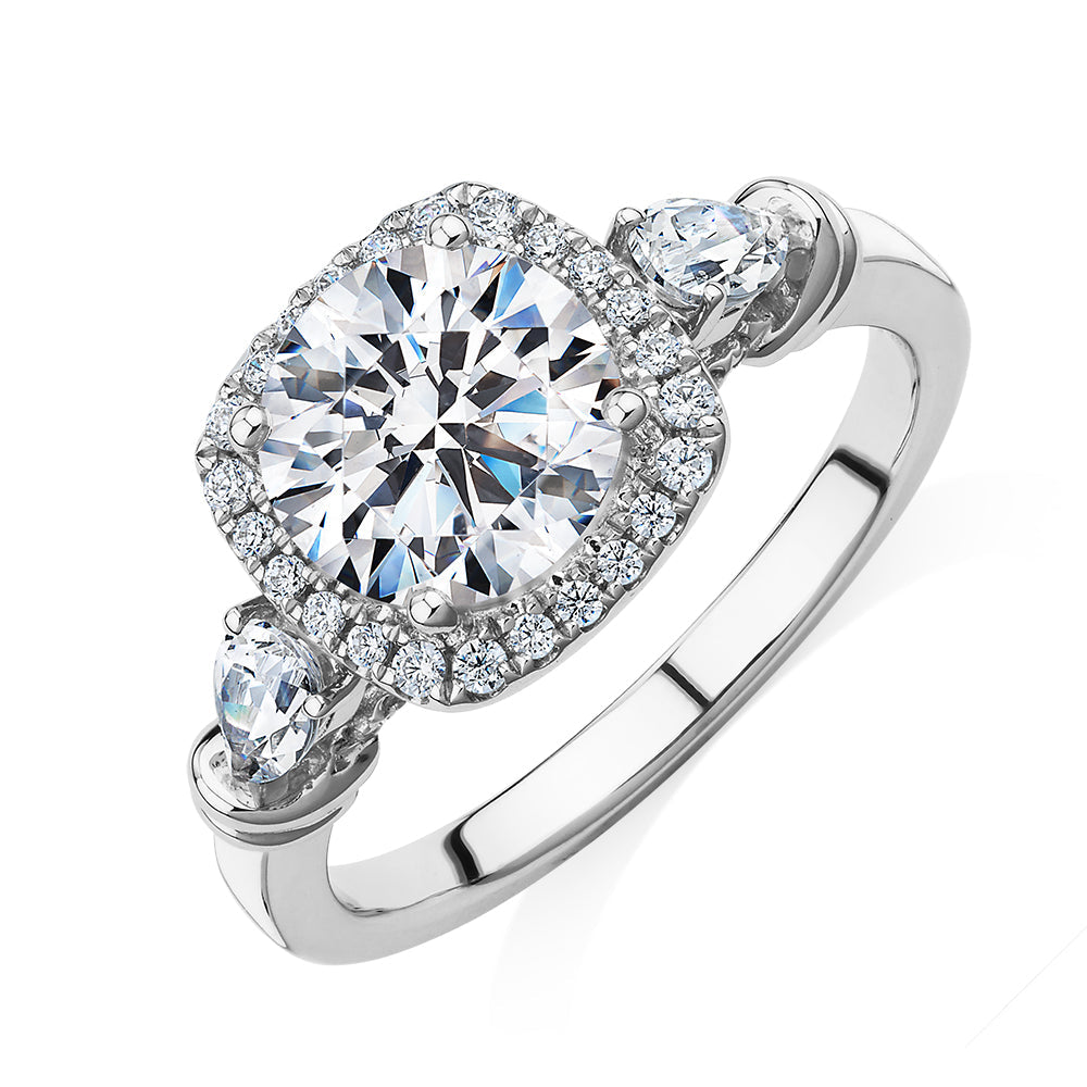 Round Brilliant halo engagement ring with 2.78 carats* of diamond simulants in 14 carat white gold
