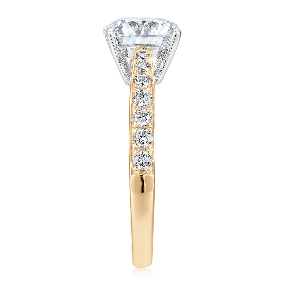 Round Brilliant shouldered engagement ring with 2.32 carats* of diamond simulants in 14 carat yellow and white gold