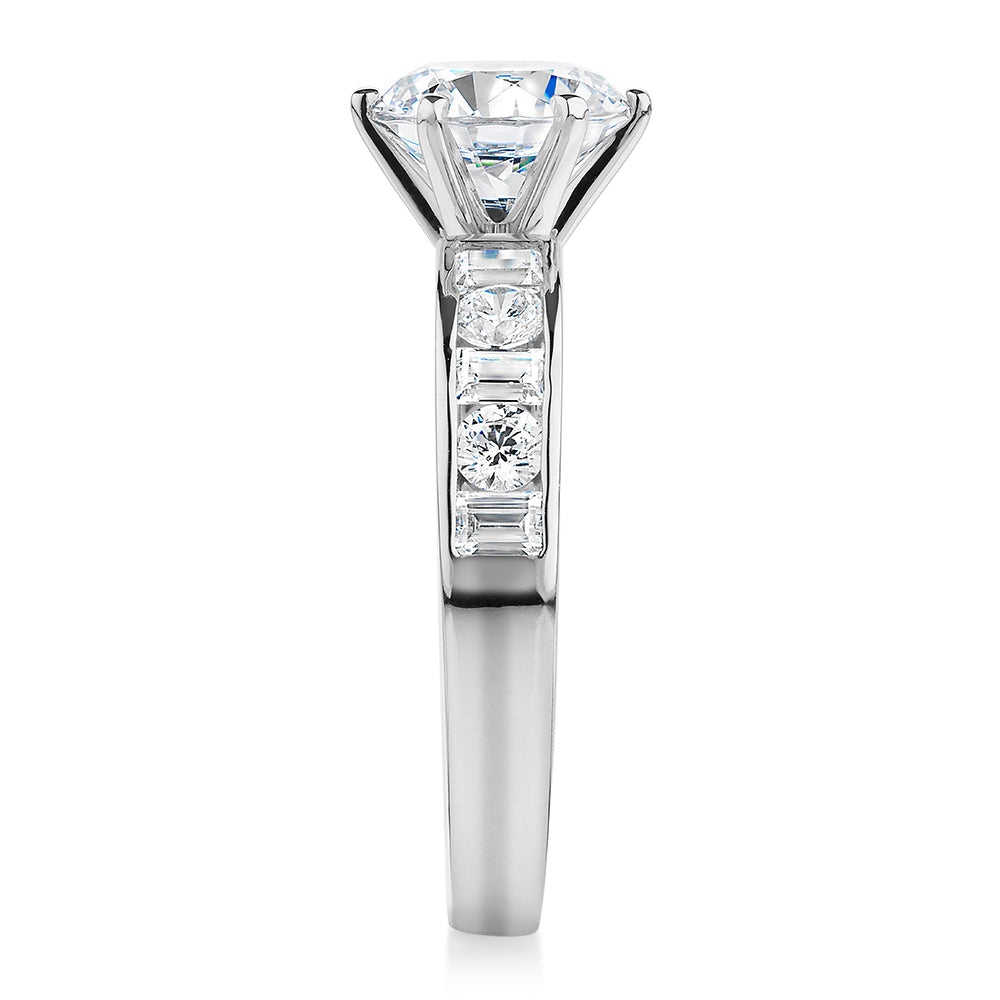 Round Brilliant and Baguette shouldered engagement ring with 2.72 carats* of diamond simulants in 14 carat white gold