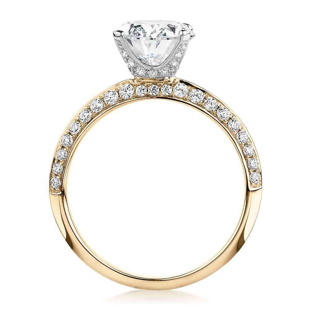 Oval shouldered engagement ring with 2.97 carats* of diamond simulants in 14 carat yellow and white gold