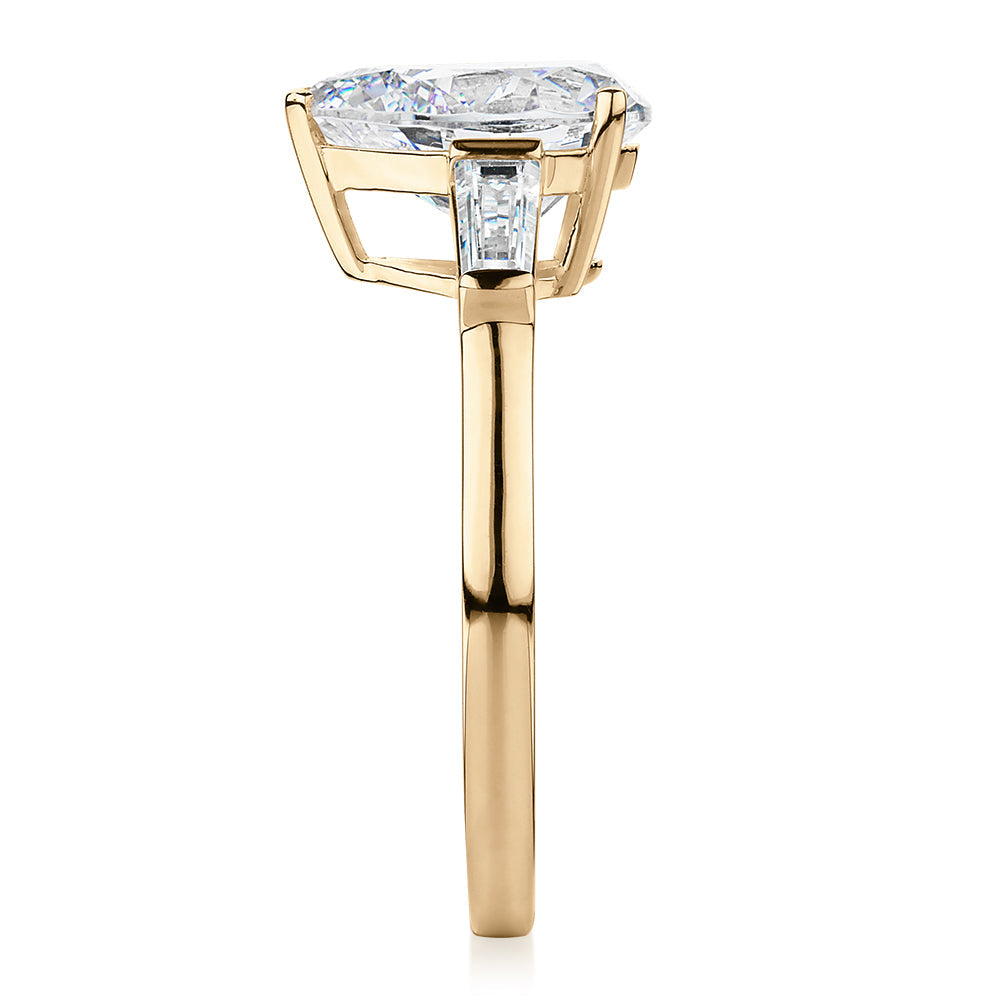 Pear shouldered engagement ring with 2.88 carats* of diamond simulants in 10 carat yellow gold