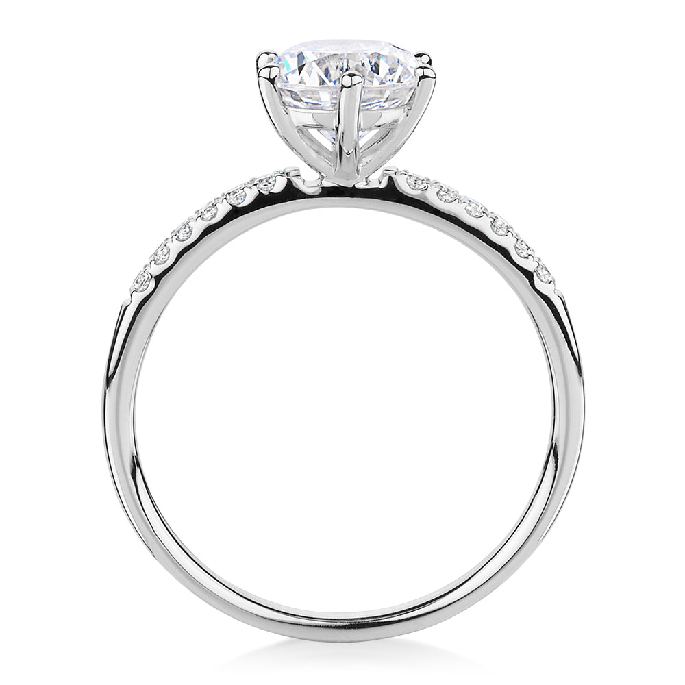 Round Brilliant shouldered engagement ring with 1.67 carats* of diamond simulants in 14 carat white gold