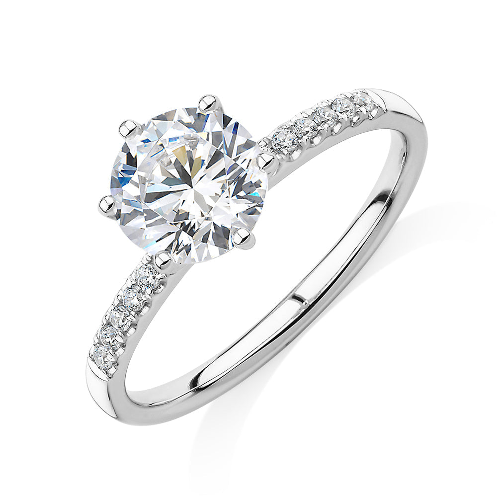Round Brilliant shouldered engagement ring with 1.67 carats* of diamond simulants in 14 carat white gold