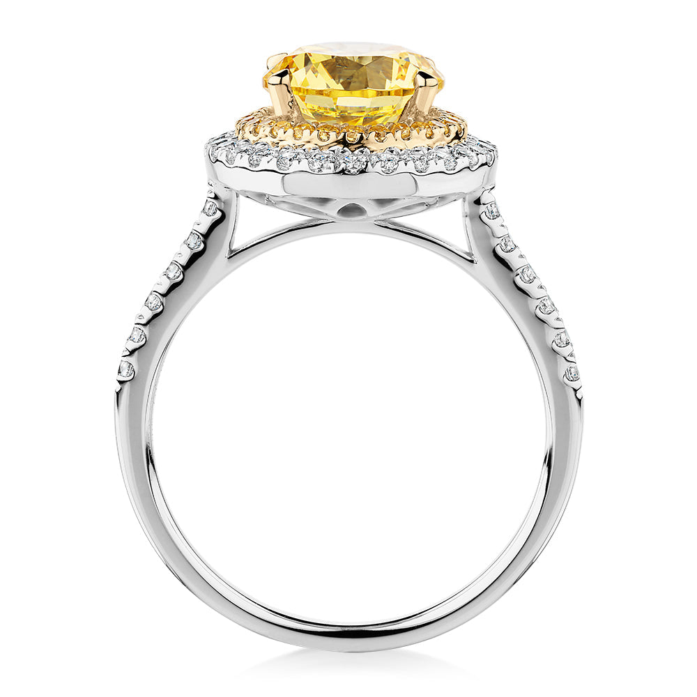 Round Brilliant halo engagement ring with 2.55 carats* of diamond simulants in 10 carat white and yellow gold