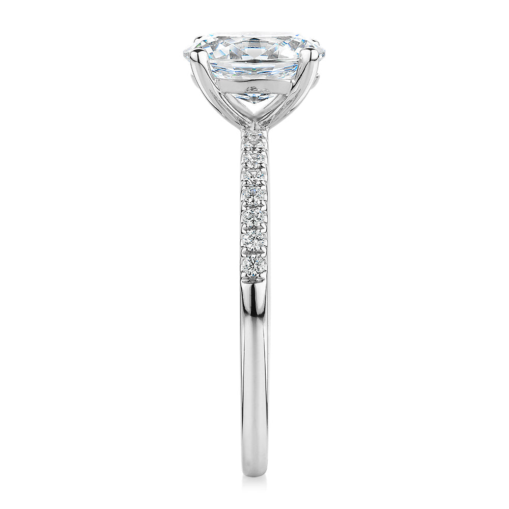 Oval and Round Brilliant shouldered engagement ring with 1.35 carats* of diamond simulants in 14 carat white gold