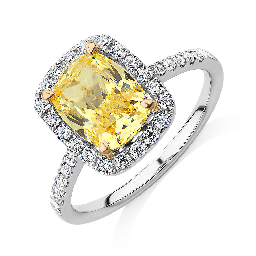 Cushion Radiant and Round Brilliant halo engagement ring with 2.94 carats* of diamond simulants in 10 carat white and yellow gold