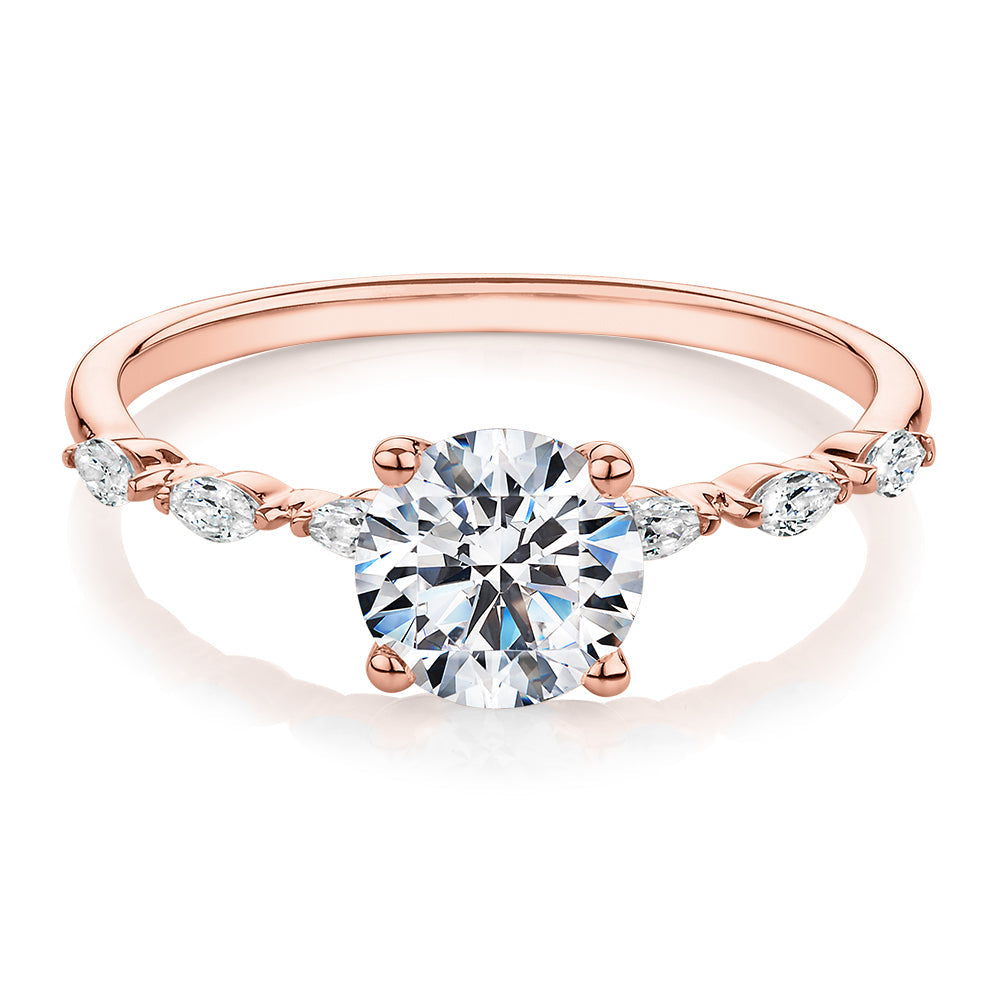 Round Brilliant shouldered engagement ring with 1.18 carats* of diamond simulants in 14 carat rose gold