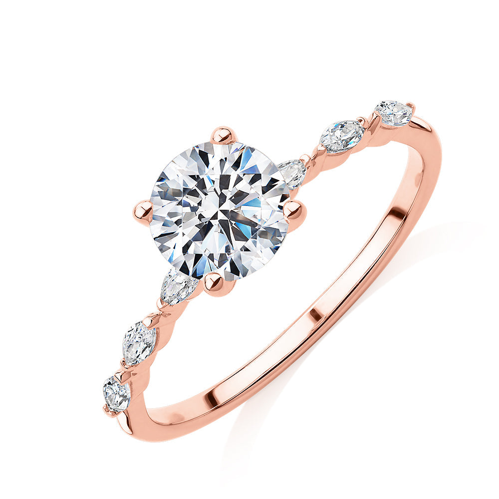 Round Brilliant shouldered engagement ring with 1.18 carats* of diamond simulants in 14 carat rose gold