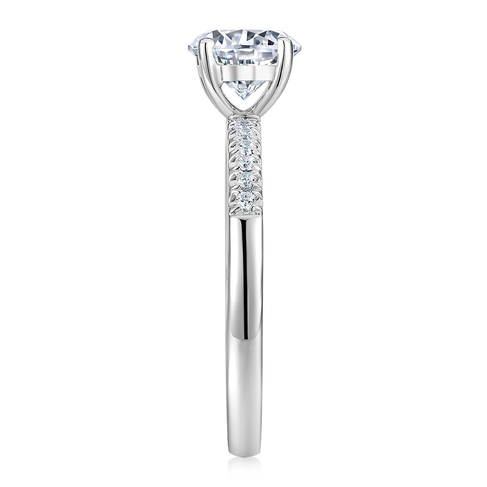 Round Brilliant shouldered engagement ring with 1.12 carats* of diamond simulants in 14 carat white gold