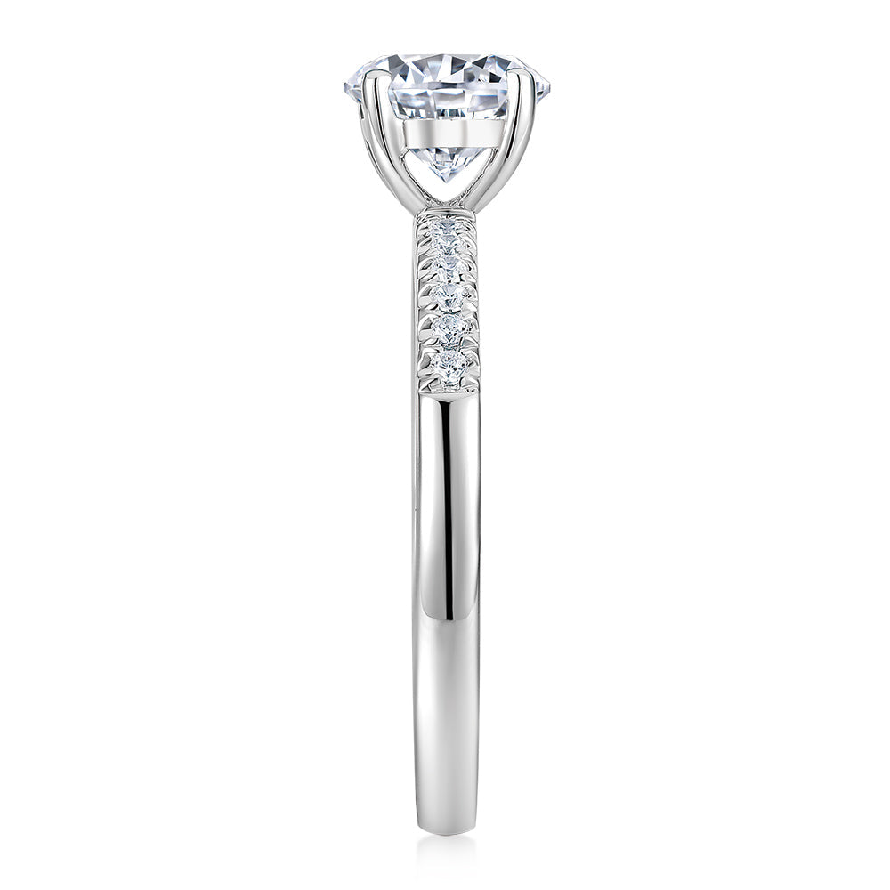 Round Brilliant shouldered engagement ring with 1.12 carats* of diamond simulants in 14 carat white gold