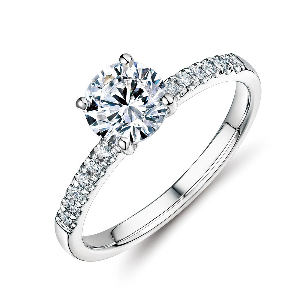 Round Brilliant shouldered engagement ring with 1.12 carats* of diamond simulants in 14 carat white gold