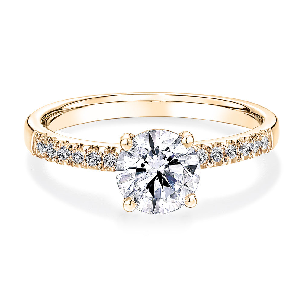 Round Brilliant shouldered engagement ring with 1.12 carats* of diamond simulants in 14 carat yellow gold