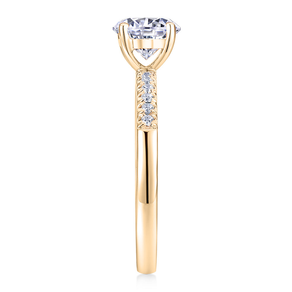Round Brilliant shouldered engagement ring with 1.12 carats* of diamond simulants in 14 carat yellow gold