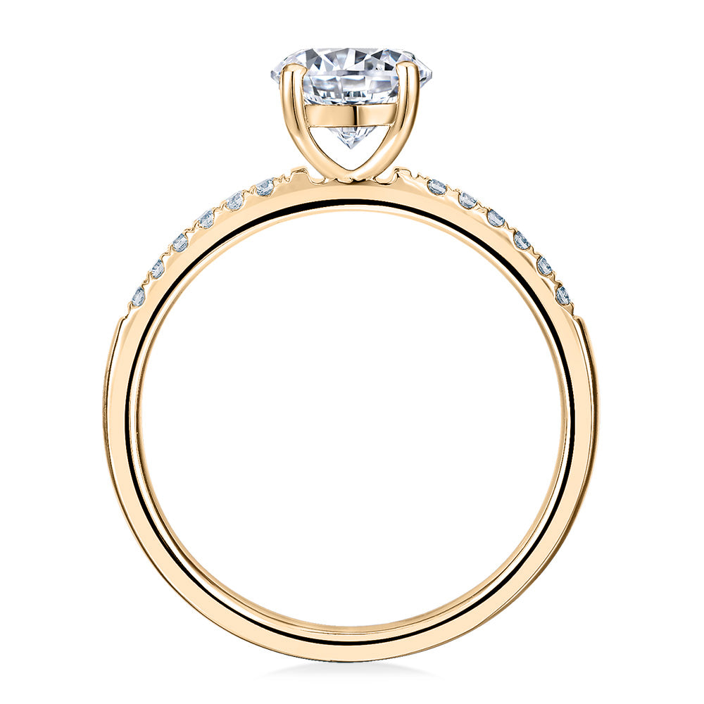 Round Brilliant shouldered engagement ring with 1.12 carats* of diamond simulants in 14 carat yellow gold