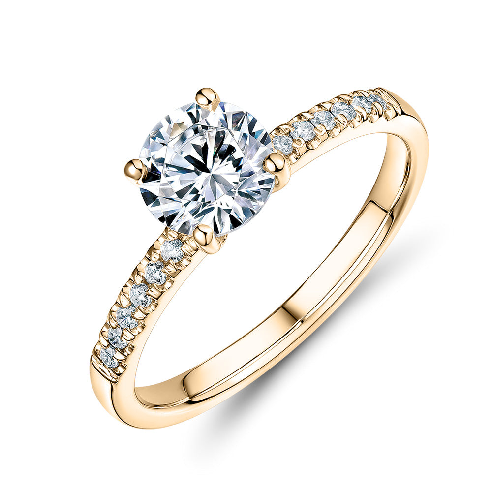 Round Brilliant shouldered engagement ring with 1.12 carats* of diamond simulants in 14 carat yellow gold