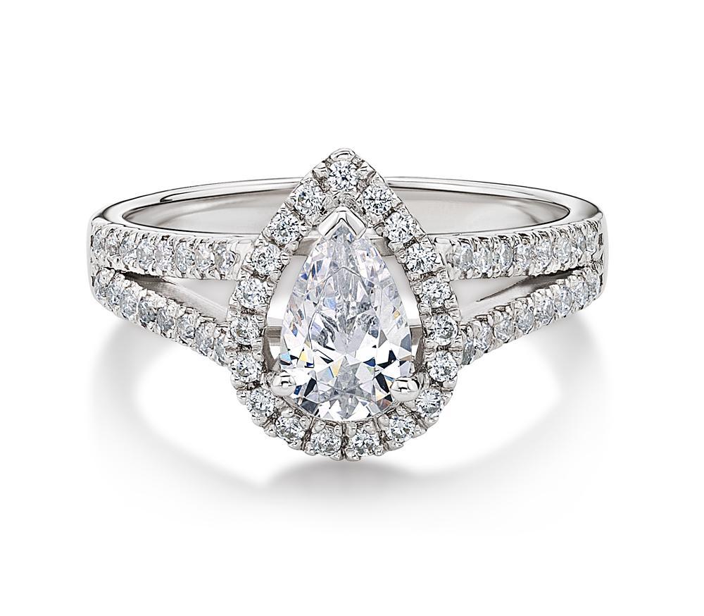 Pear and Round Brilliant halo engagement ring with 1.16 carats* of diamond simulants in 14 carat whi