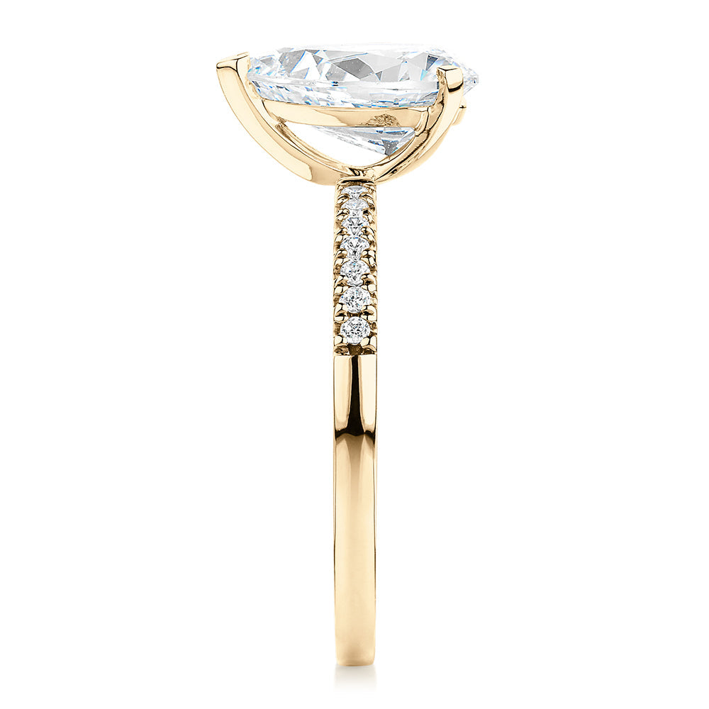 Pear and Round Brilliant shouldered engagement ring with 1.88 carats* of diamond simulants in 14 carat yellow gold
