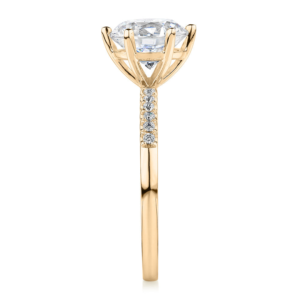 Round Brilliant shouldered engagement ring with 2.12 carats* of diamond simulants in 14 carat yellow gold