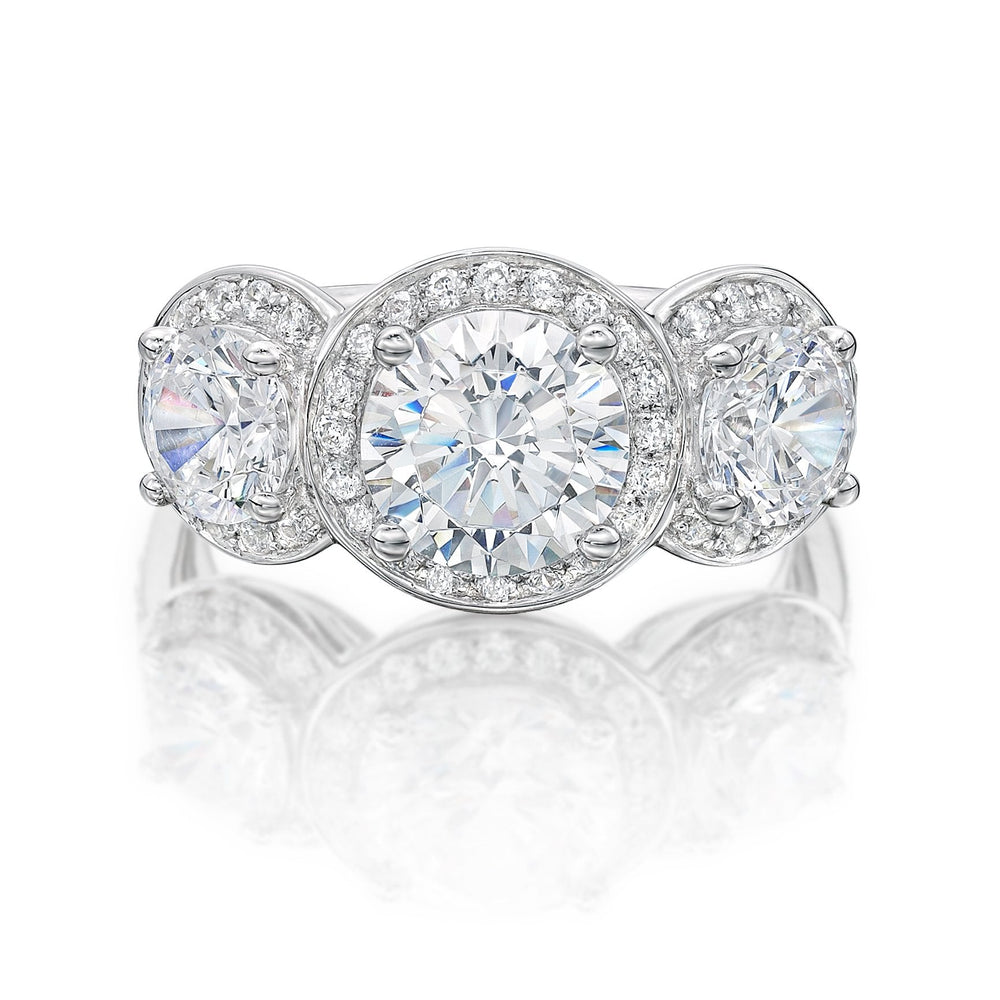 Round Brilliant Cut Halo Three Stone Ring in White Gold
