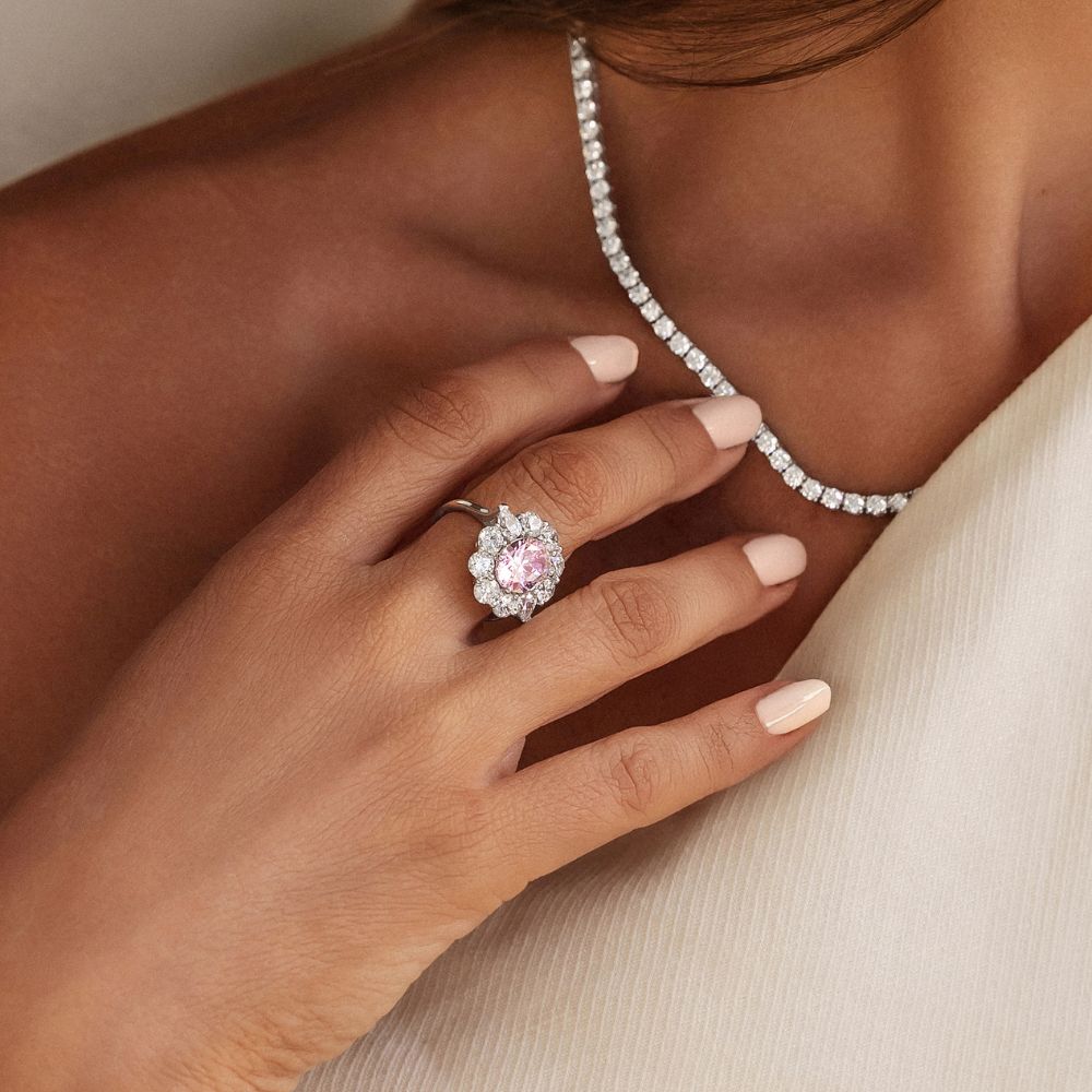 Dress ring with 5.24 carats* of diamond simulants in 10 carat white gold