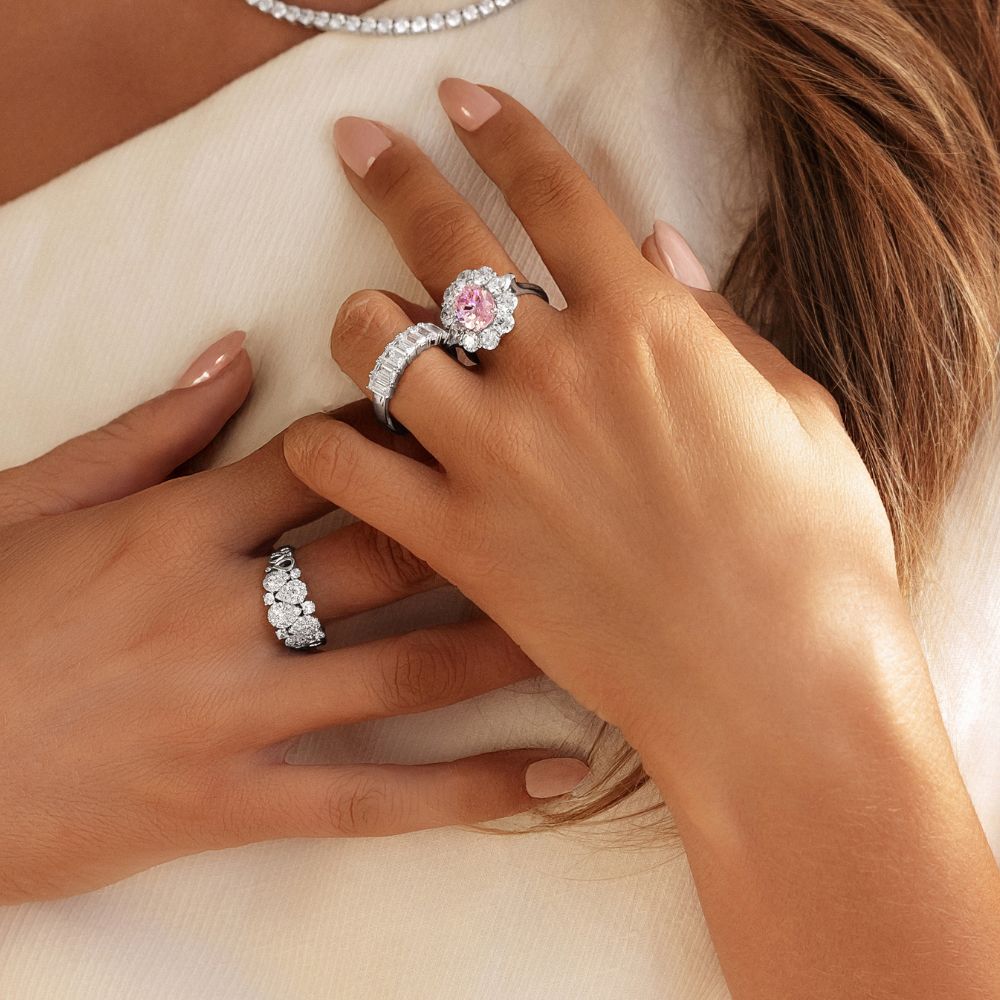Dress ring with 5.24 carats* of diamond simulants in 10 carat white gold
