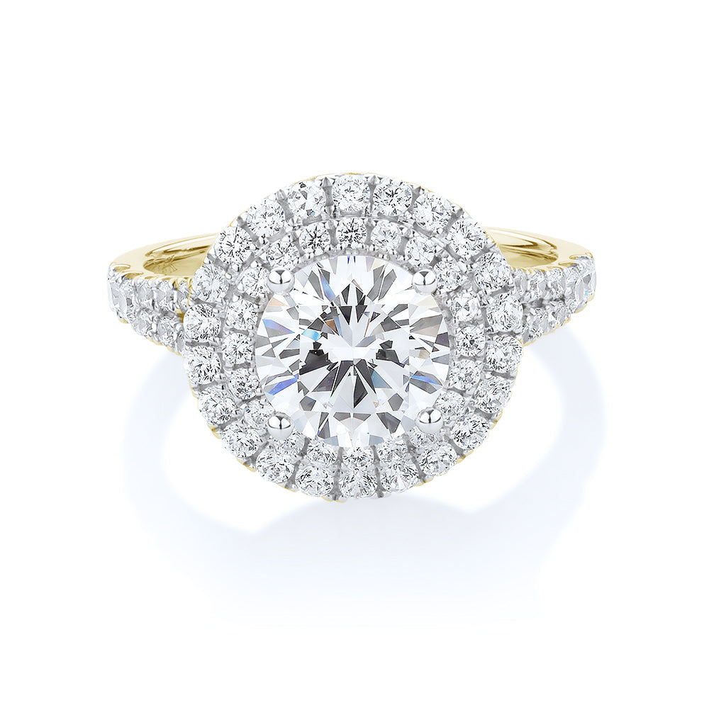 Round Brilliant halo engagement ring with 2.87 carats* of diamond simulants in 10 carat yellow and white gold