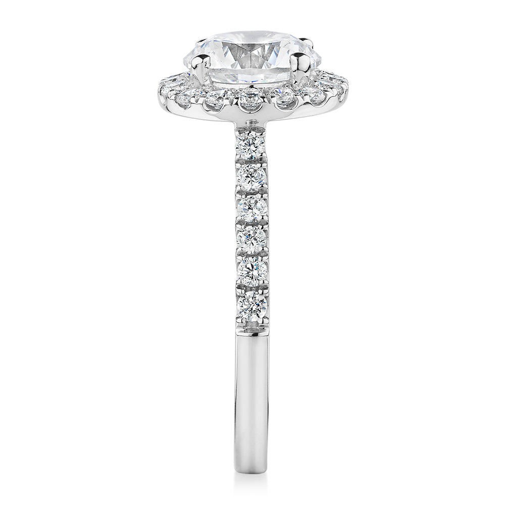 Round Brilliant halo engagement ring with 2.46 carats* of diamond simulants in 10 carat white gold
