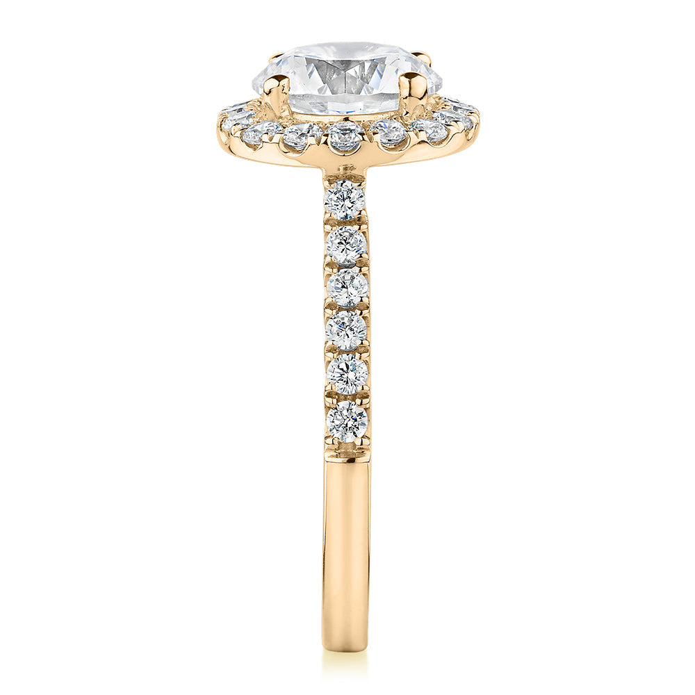 Round Brilliant halo engagement ring with 2.46 carats* of diamond simulants in 10 carat yellow gold