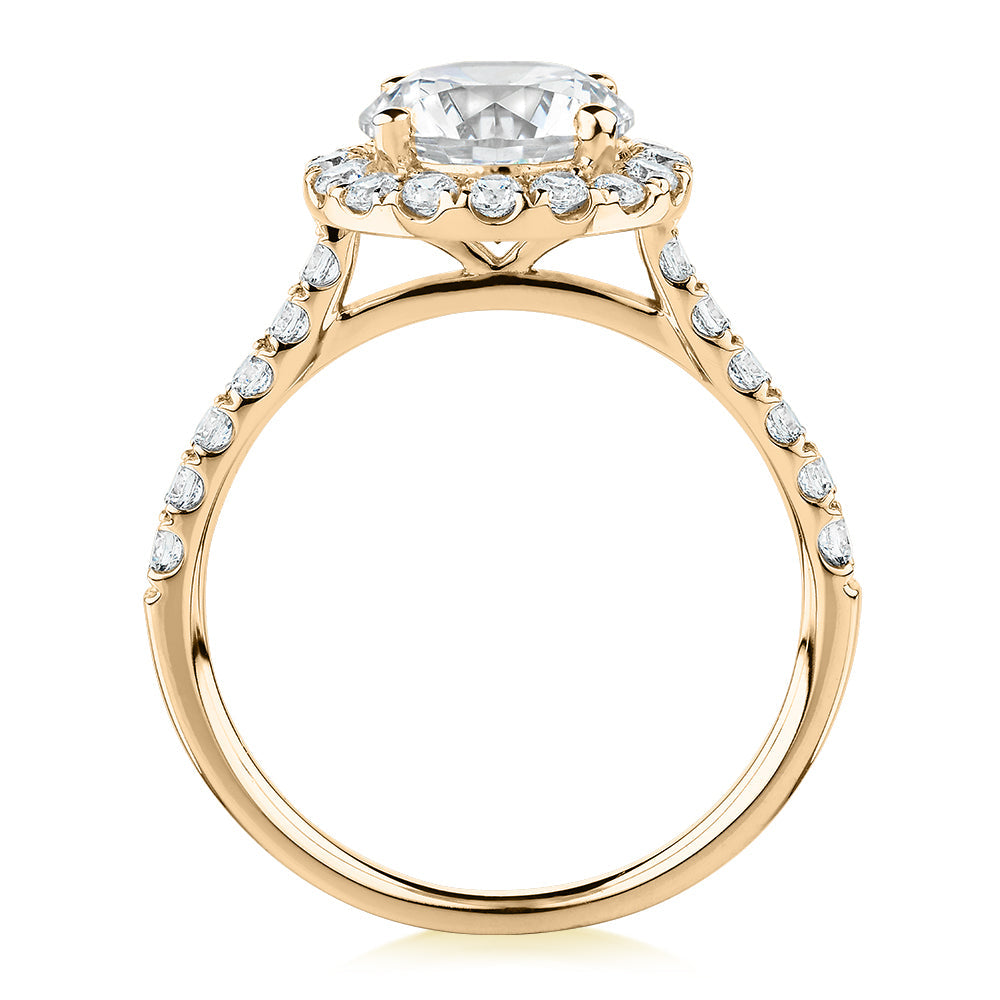 Round Brilliant halo engagement ring with 2.46 carats* of diamond simulants in 10 carat yellow gold