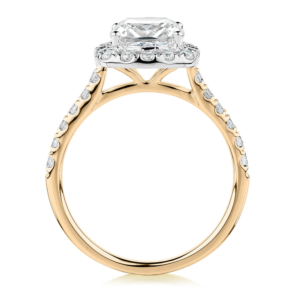 Cushion and Round Brilliant halo engagement ring with 2.09 carats* of diamond simulants in 10 carat yellow and white gold