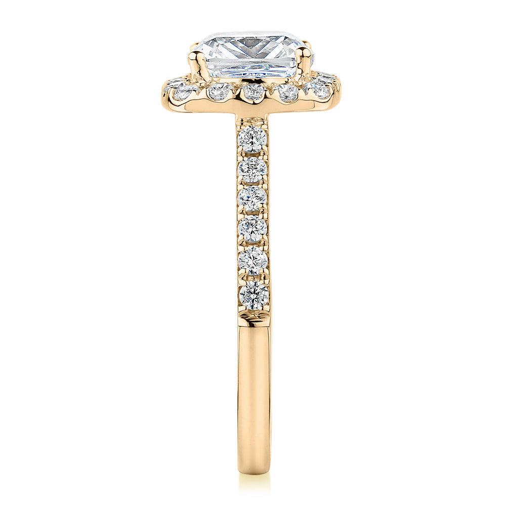 Cushion and Round Brilliant halo engagement ring with 2.09 carats* of diamond simulants in 10 carat yellow gold