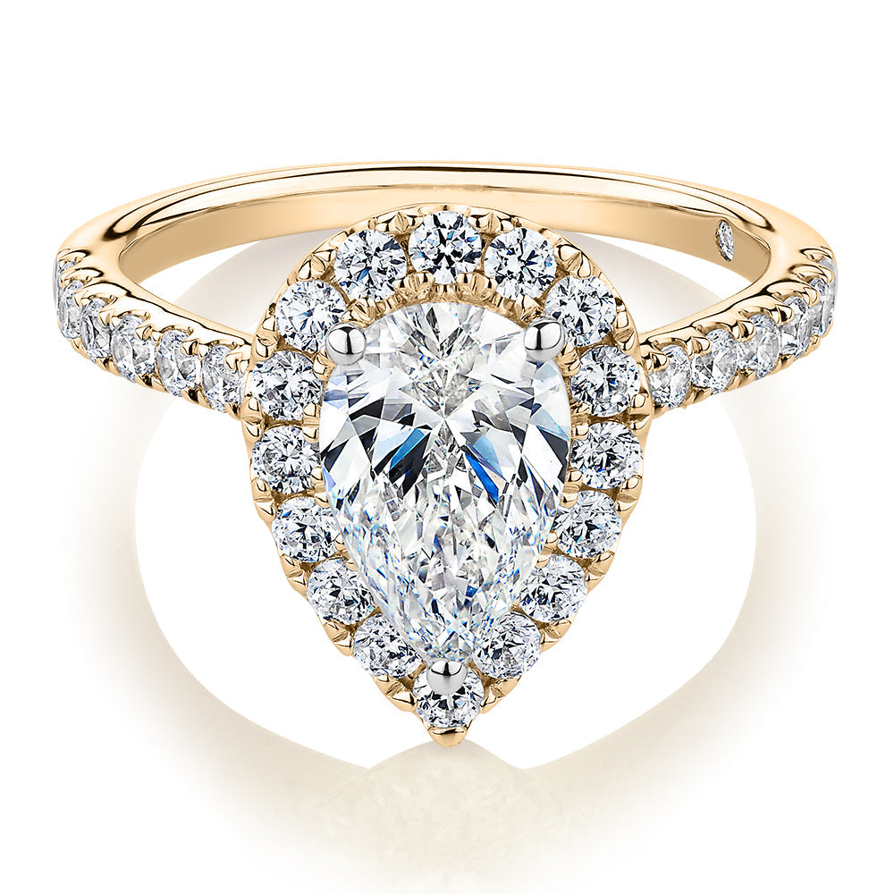 Signature Simulant Diamond 2.17 carat* TW pear and round brilliant shouldered halo engagement ring in 10 carat yellow and white gold