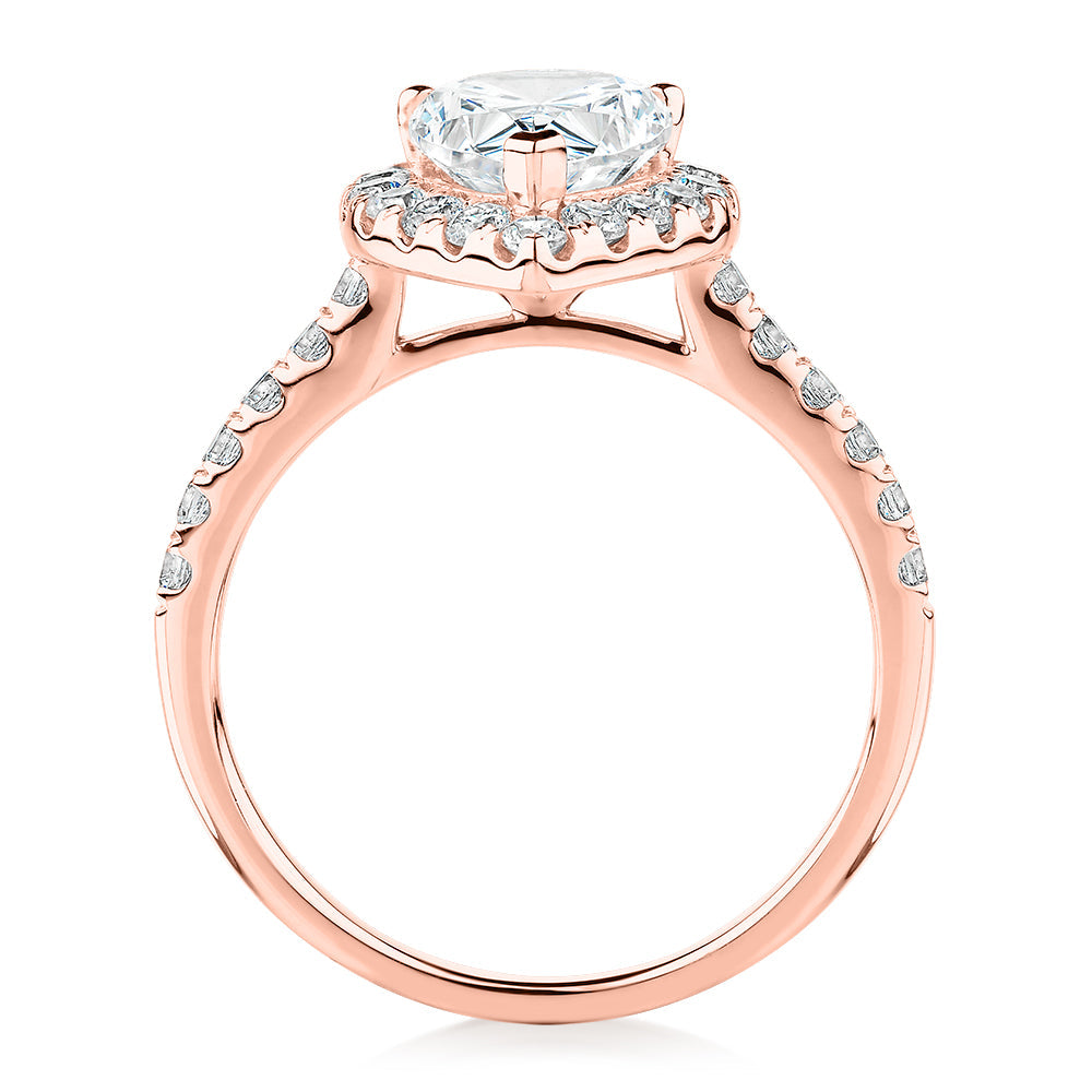 Pear and Round Brilliant halo engagement ring with 2.38 carats* of diamond simulants in 10 carat rose gold