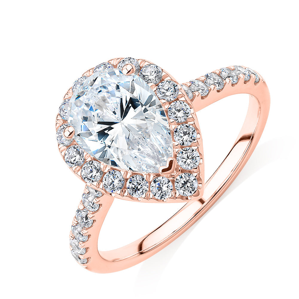 Pear and Round Brilliant halo engagement ring with 2.38 carats* of diamond simulants in 10 carat rose gold
