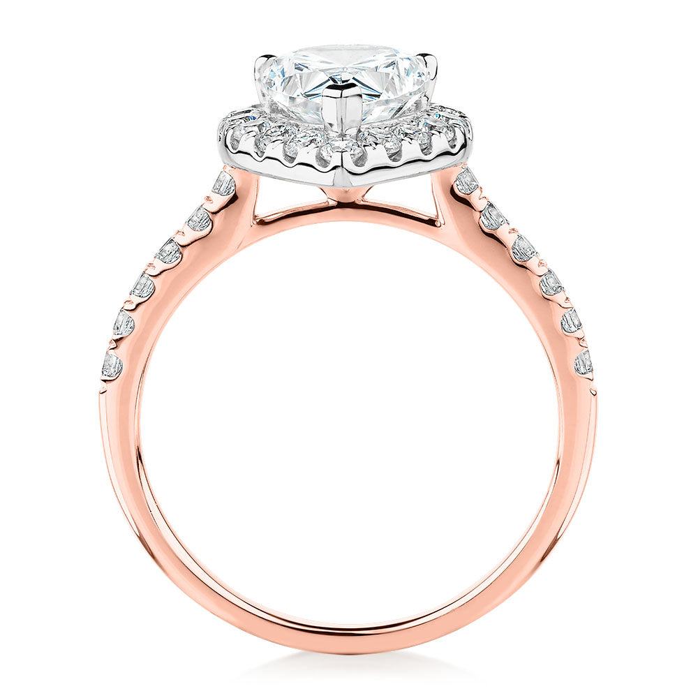 Pear and Round Brilliant halo engagement ring with 2.38 carats* of diamond simulants in 10 carat rose and white gold
