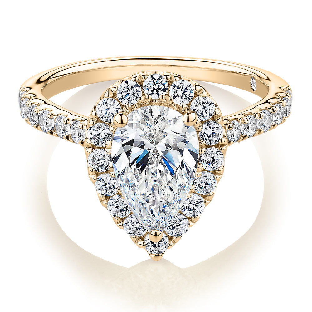 Signature Simulant Diamond 2.17 carat* TW pear and round brilliant shouldered halo engagement ring in 10 carat yellow gold